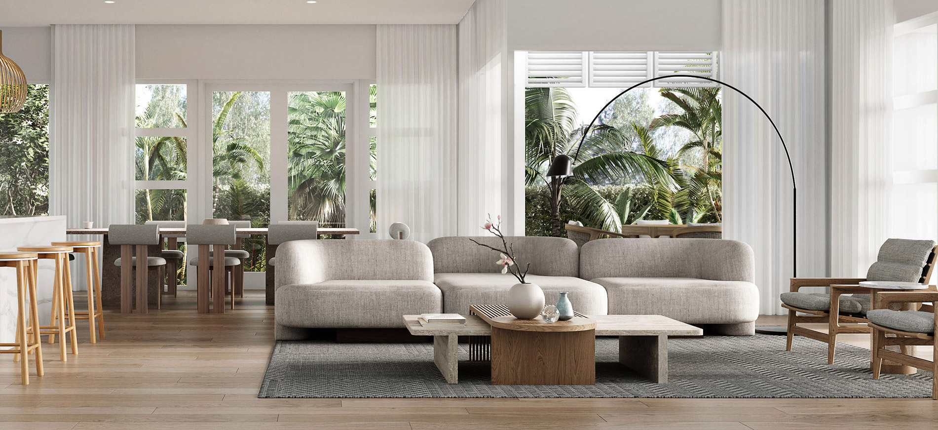 Coastal modern open plan living and dining space with soft neutral tones and natural light