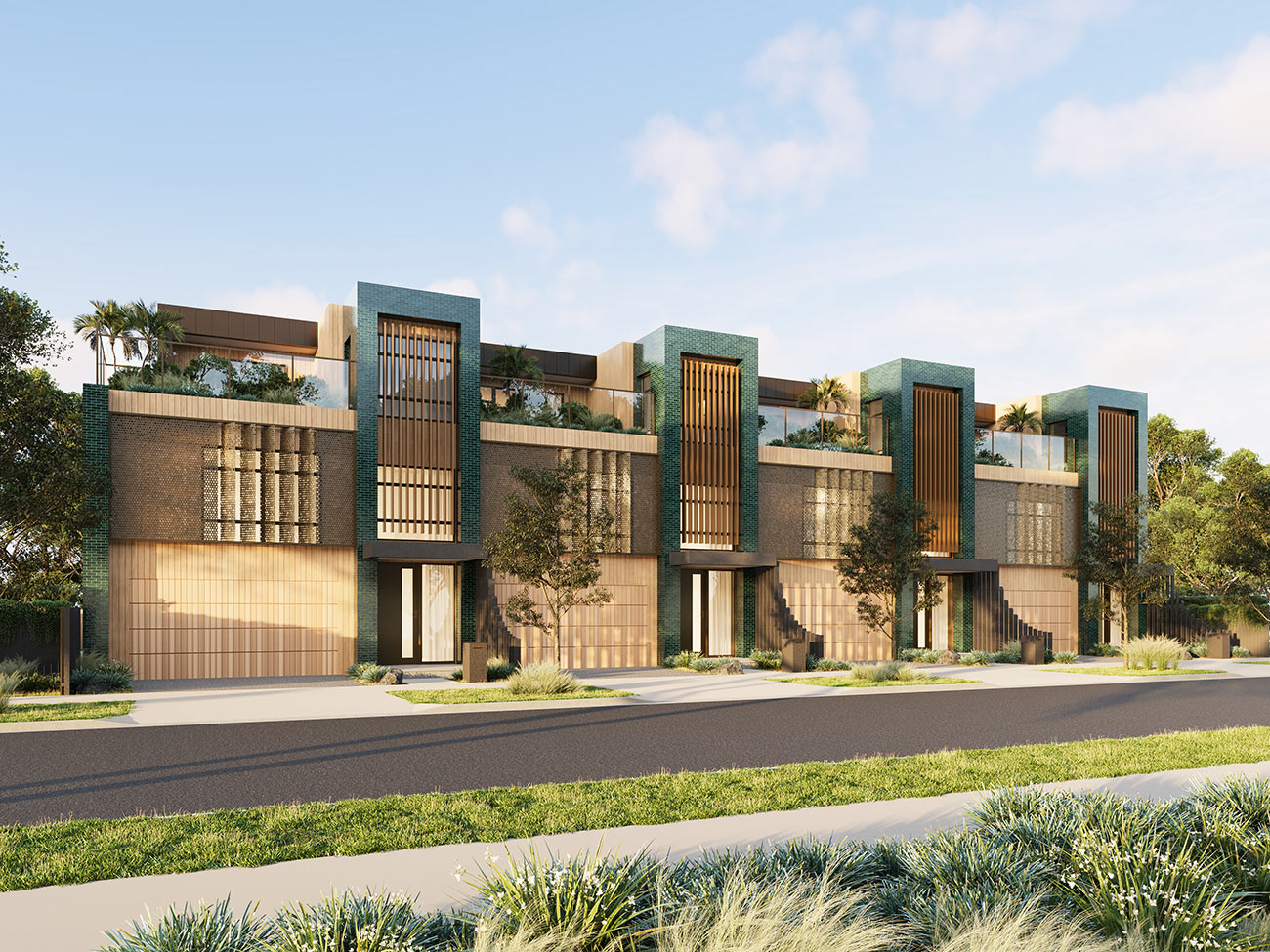 Contemporary townhouse row with green brick facade and vertical elements