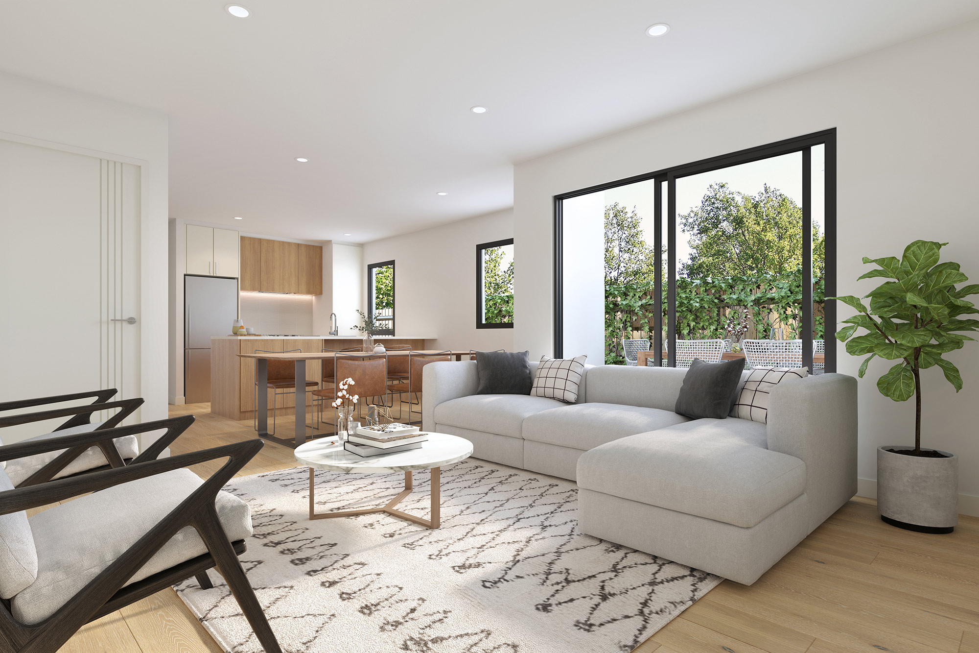 Modern home interior with open plan living and kitchen, large windows and natural light