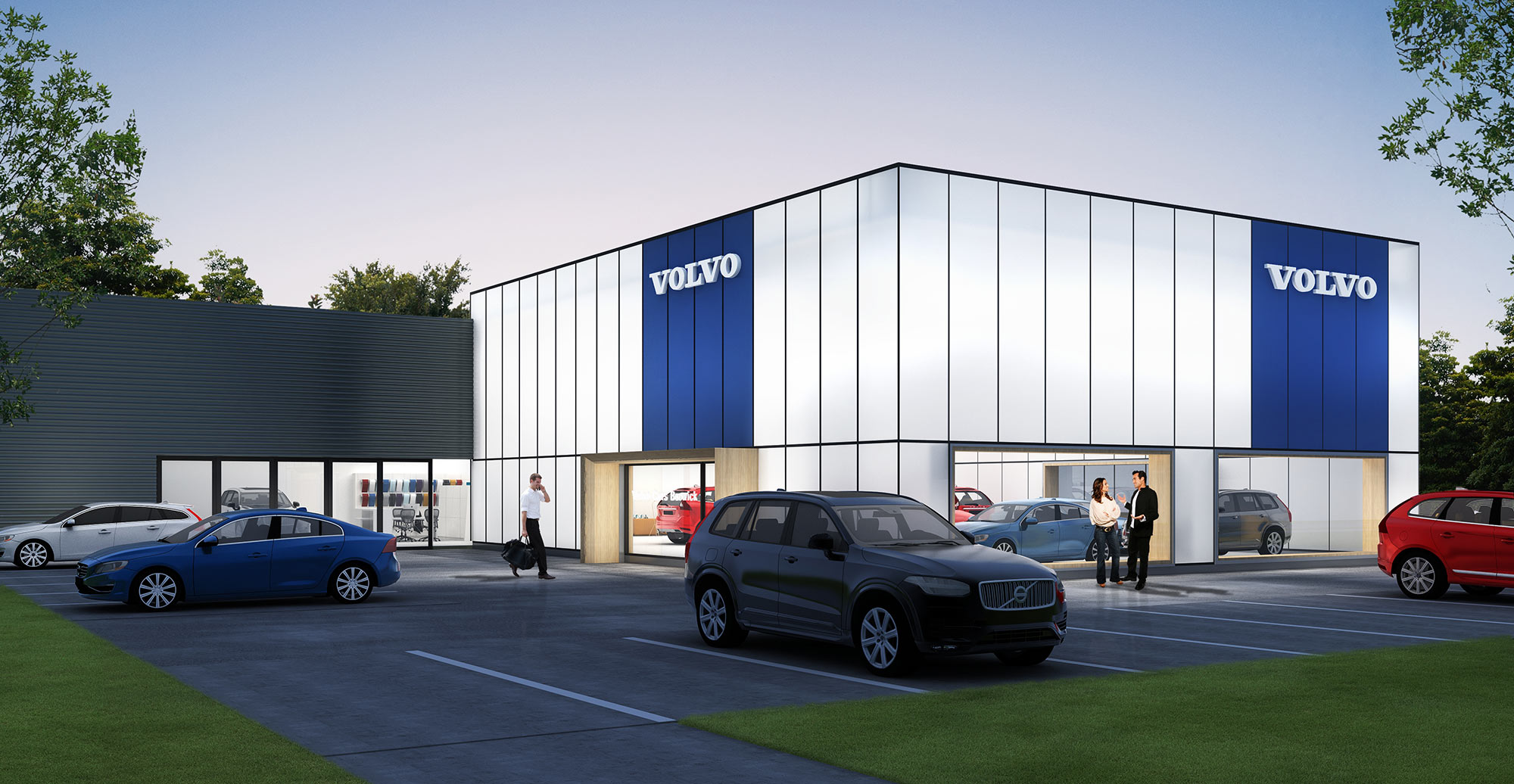 Modern automotive dealership exterior with branded Volvo showroom and vehicle display areas