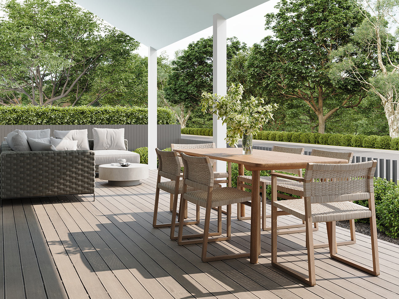 3D render of covered veranda with outdoor dining table, lounge seating and landscaped garden outlook