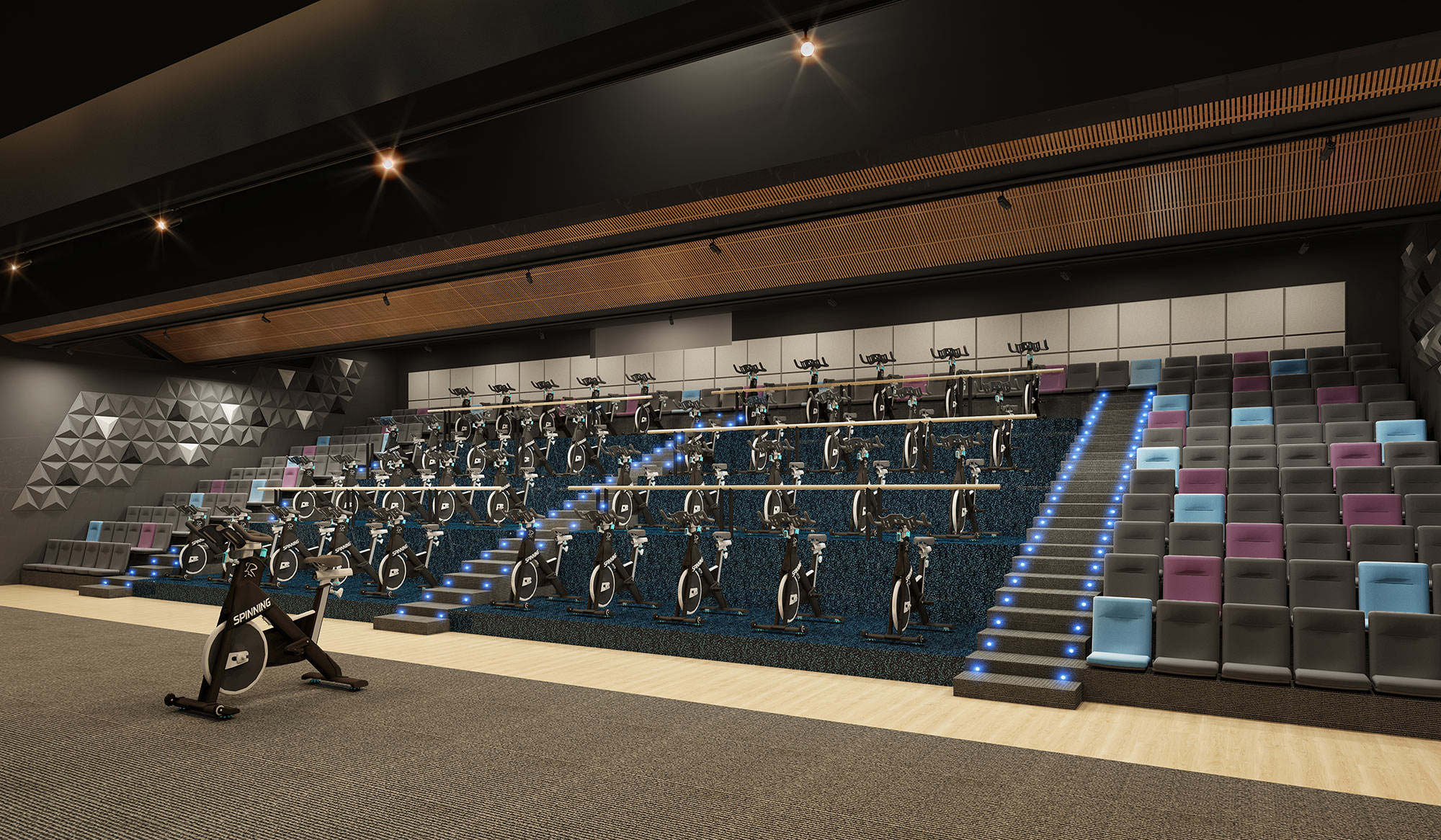 3D Rendering of a stadium-style spin cycle fitness studio with tiered seating and immersive lighting