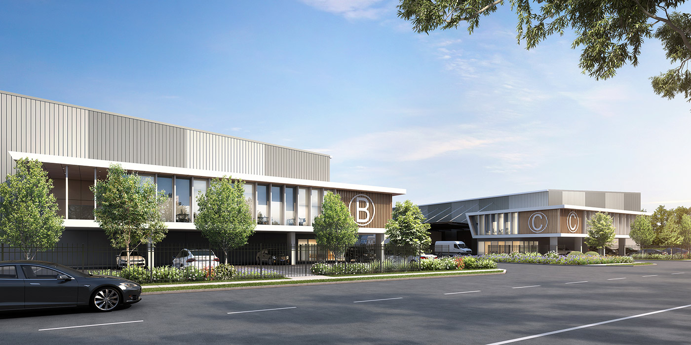 3D render of a modern industrial business park with commercial warehouse buildings, landscaping, and street frontage