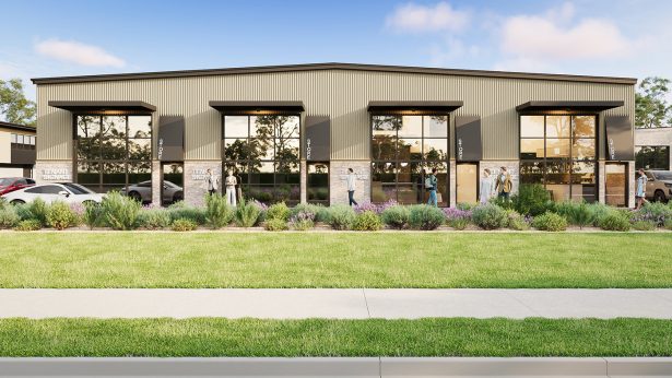 Contemporary industrial development streetscape with multiple warehouse units and landscaped verge in Penrith