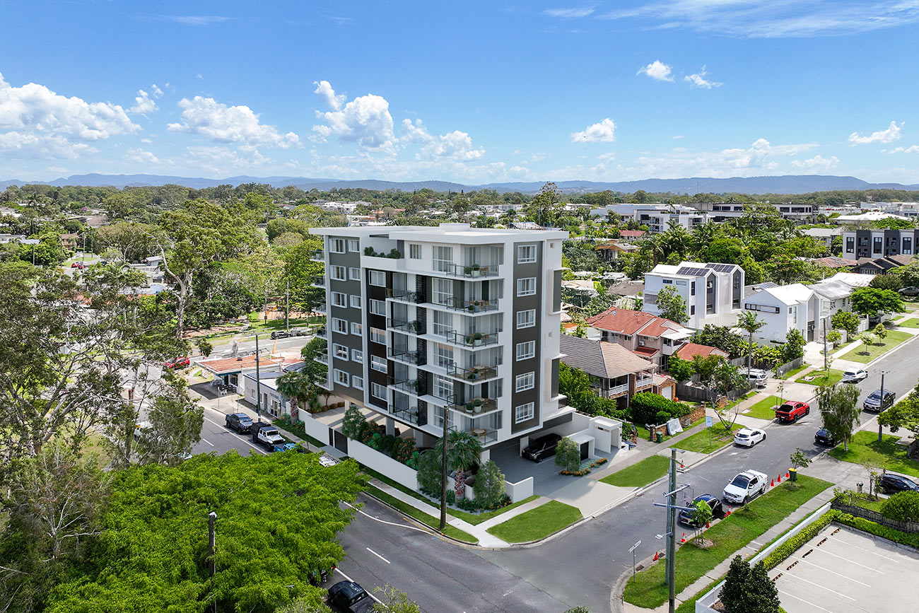 3D Render photomontage aerial view of modern apartment building with balconies surrounded by suburban houses streets greenery and residential neighborhood context