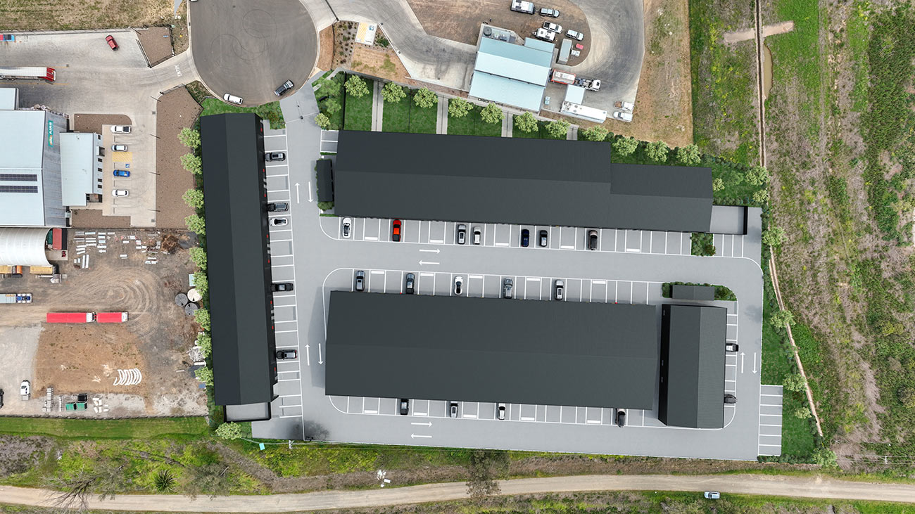 3D Render photomontage top view of industrial warehouse site plan with parking spaces access roads landscaping and surrounding land context