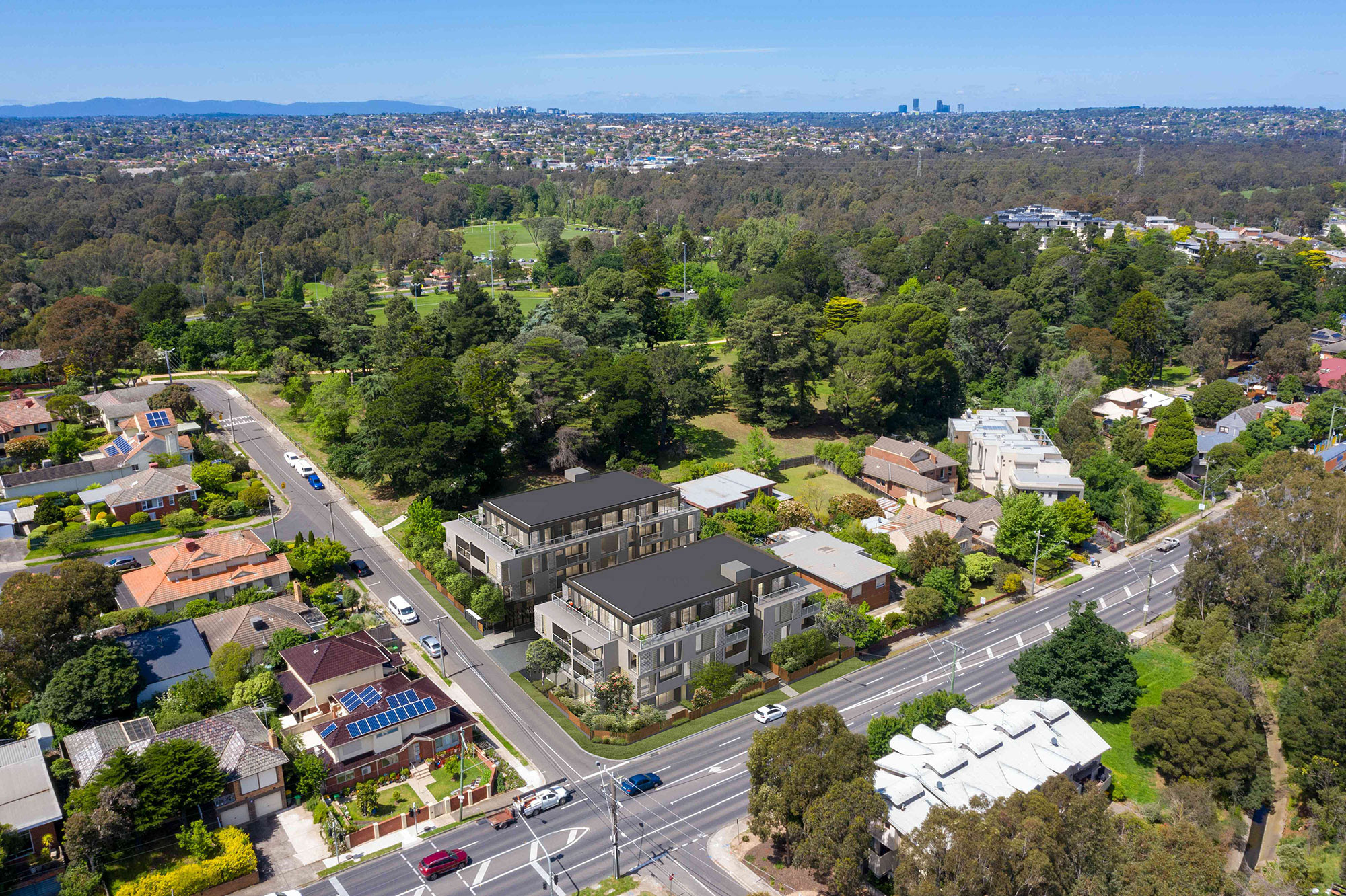 3D Render photomontage aerial view of suburban apartment development integrated into residential neighborhood with roads greenery and realistic urban planning context